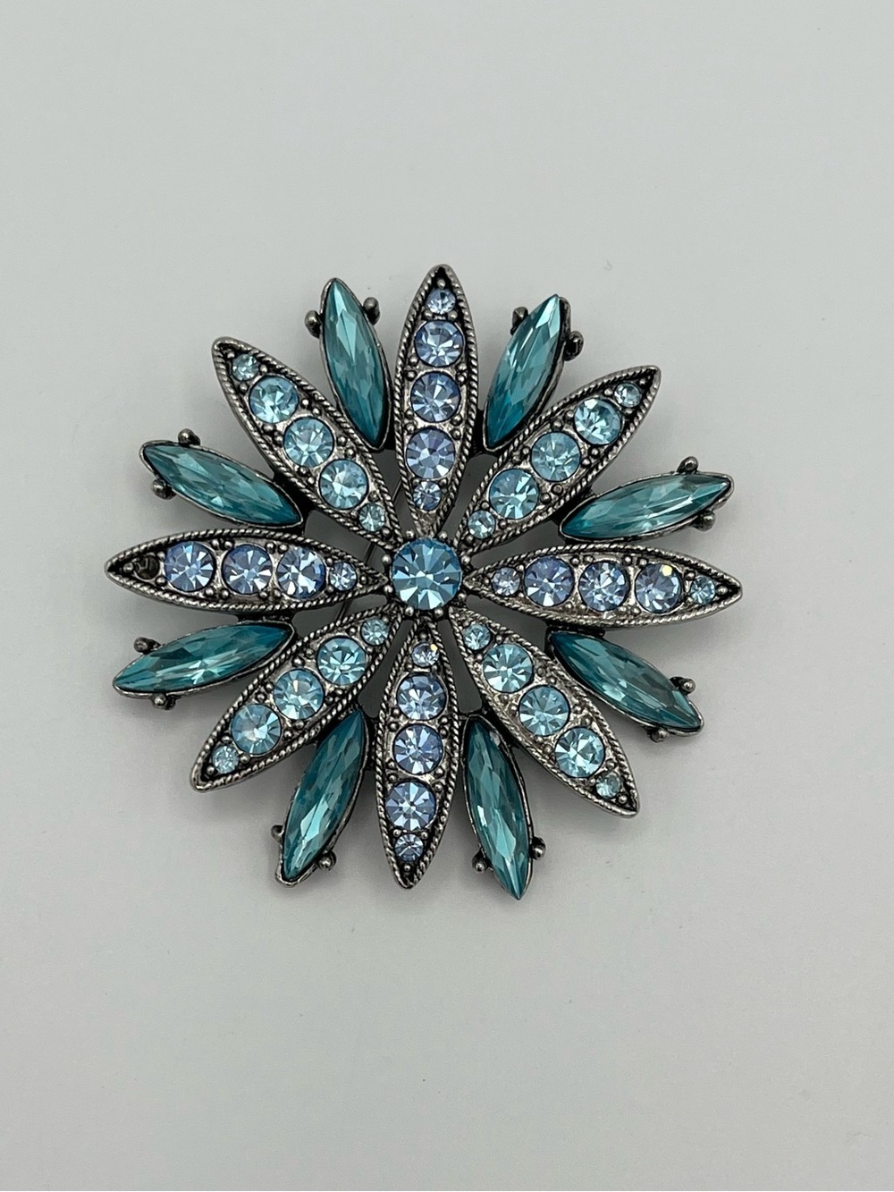 Vintage 1950s Blue Rhinestone Starburst Flower Brooch Pin